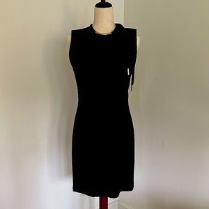 GUCCI Timeless little black dress with Gold metal details.